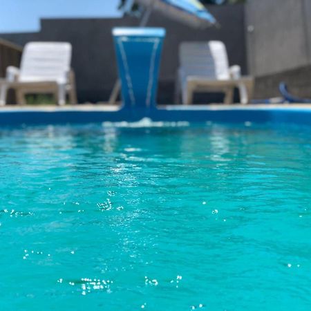 Pousada Suites Do Rosa Прайя-ду-Роза Екстериор снимка