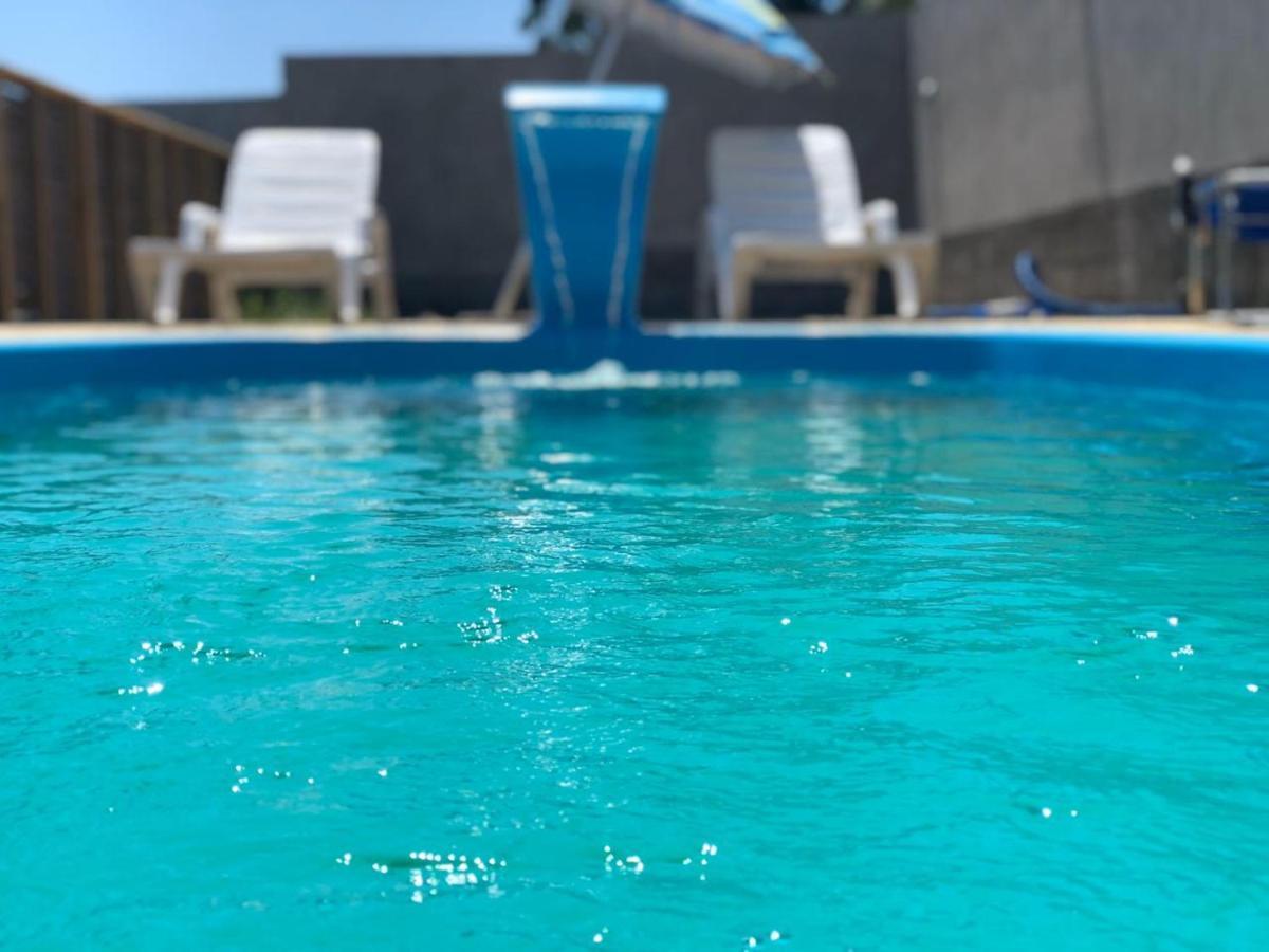 Pousada Suites Do Rosa Прайя-ду-Роза Екстериор снимка